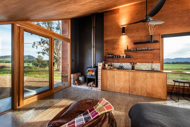 interior shot of modern cabin with minimalist decor and wood details