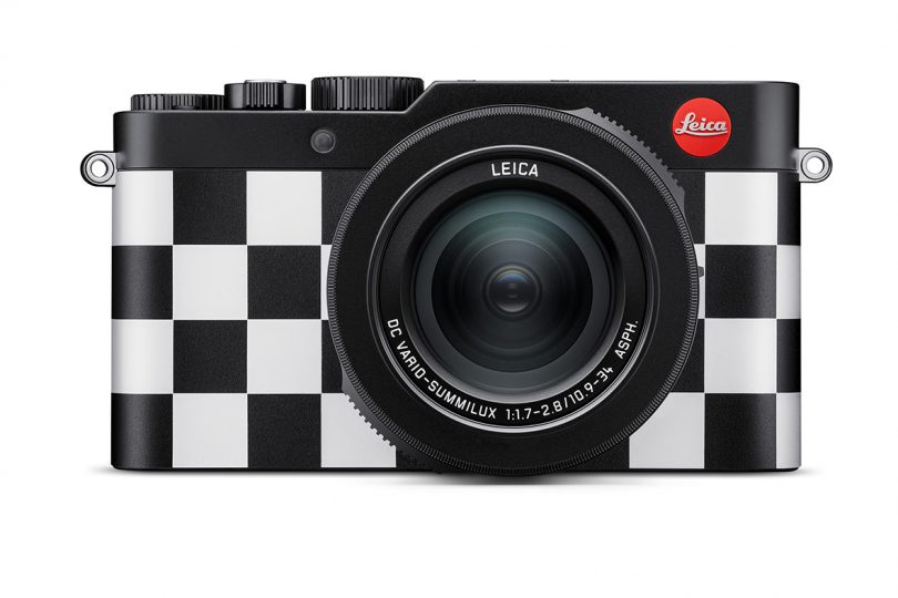 Front of Leica D-Lux 7 digital camera with checkered pattern front.