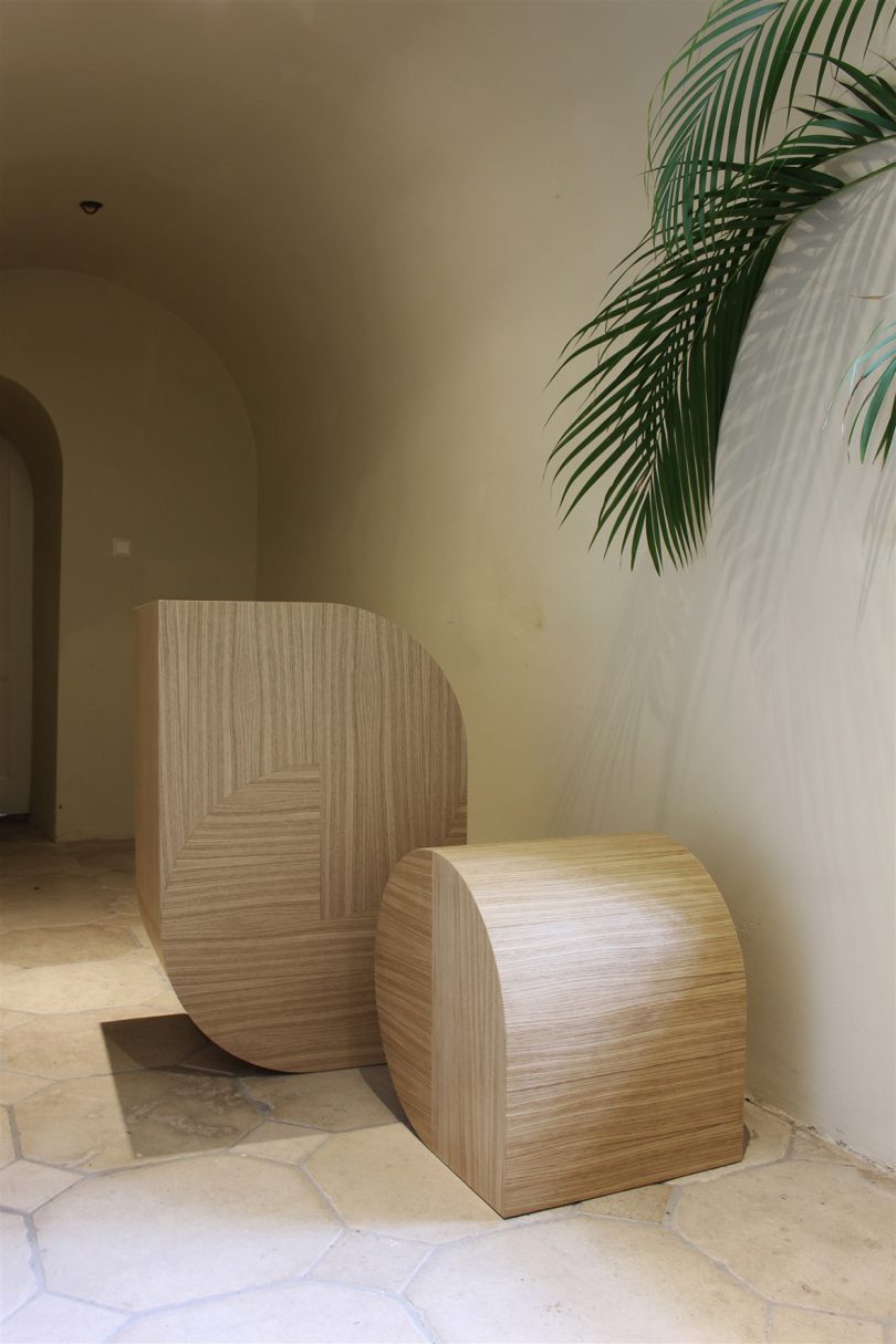 two marquetry sculptures in hallway