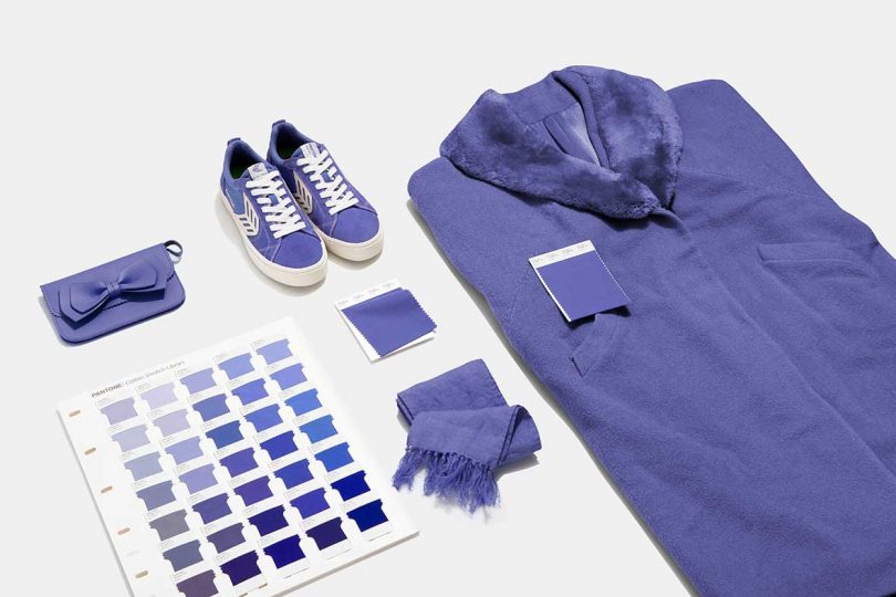 flat lay of shirt, shoes, scarf, and color swatches in pantone very peri