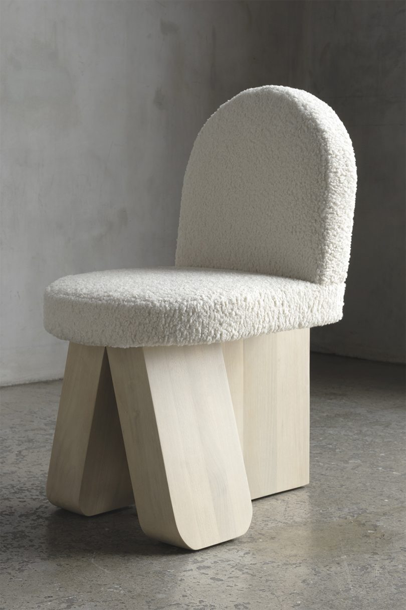 light wood chair with sherpa upholstery