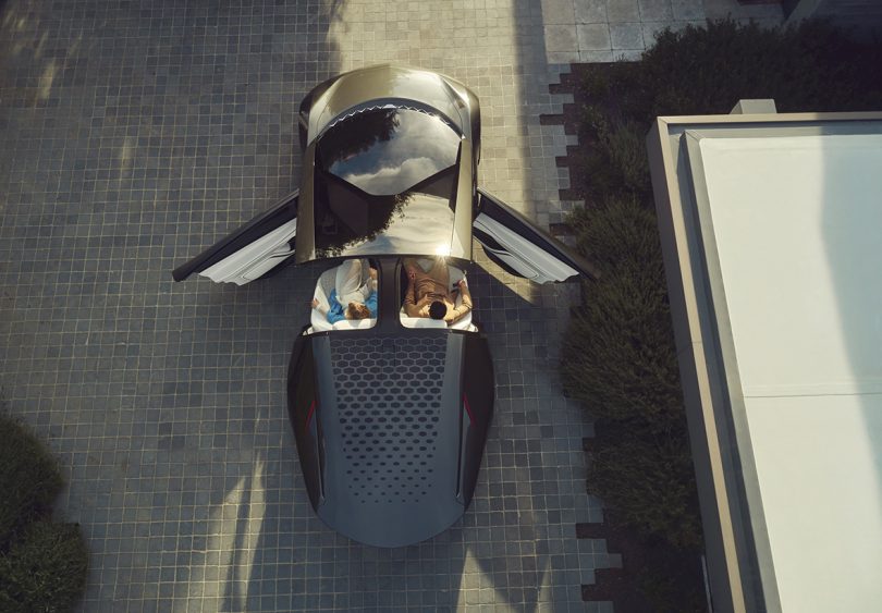 Top view of InnerSpace concept car with both doors swung out and sunroof open.