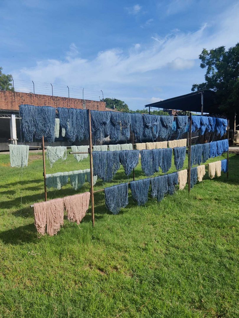 dyed yarn drying on clothesline