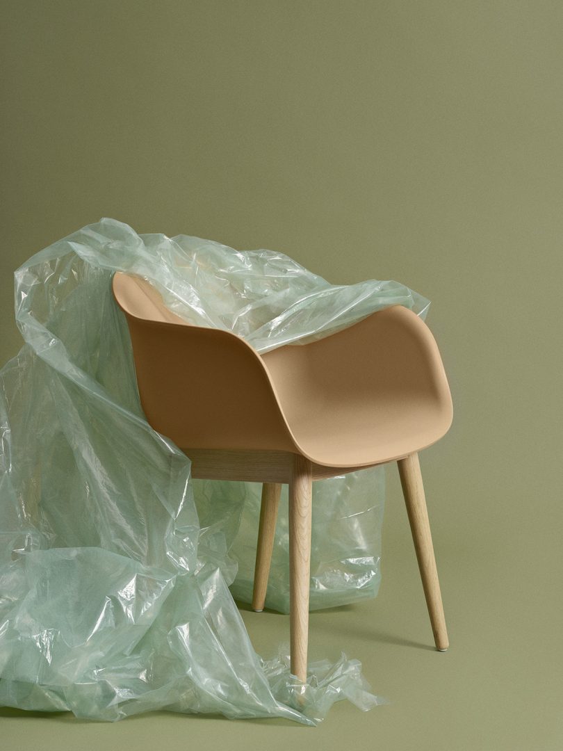 shell chair with plastic over half of it