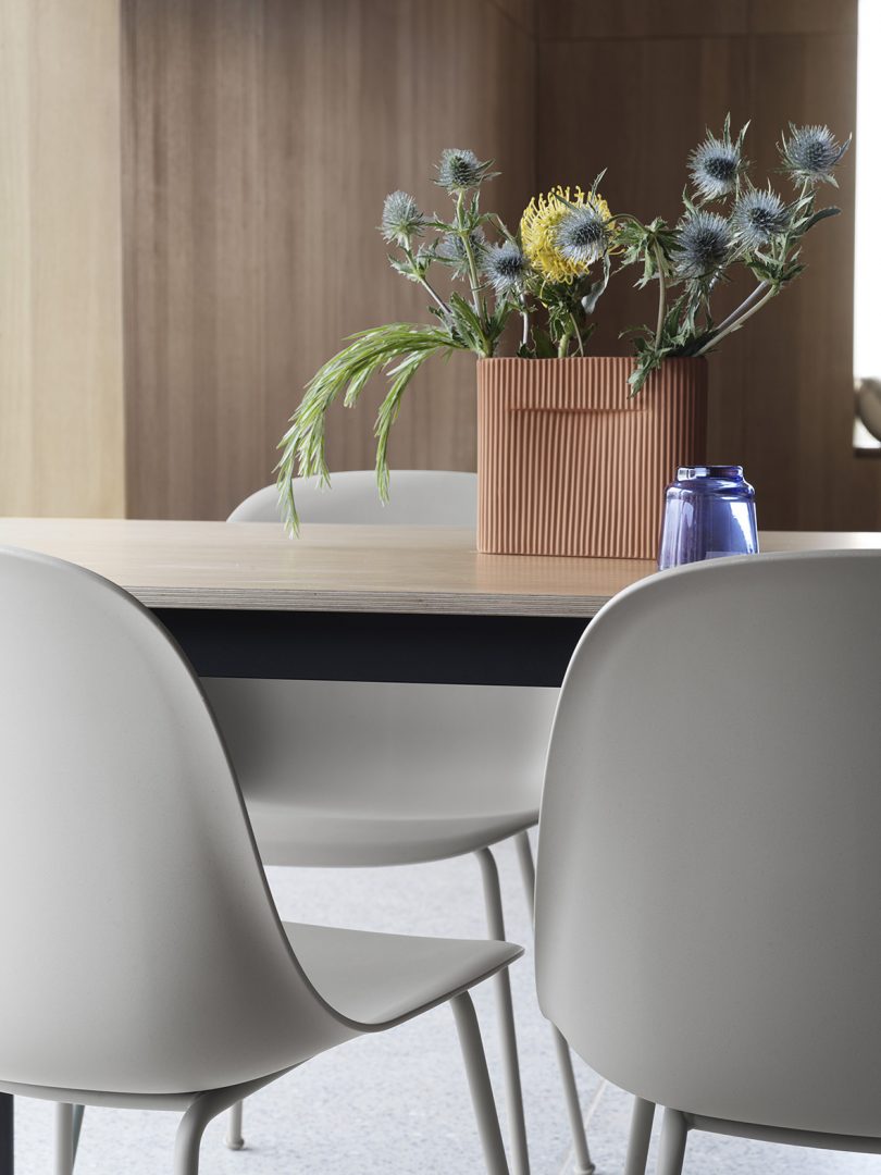 detail photo of light grey shell side chairs