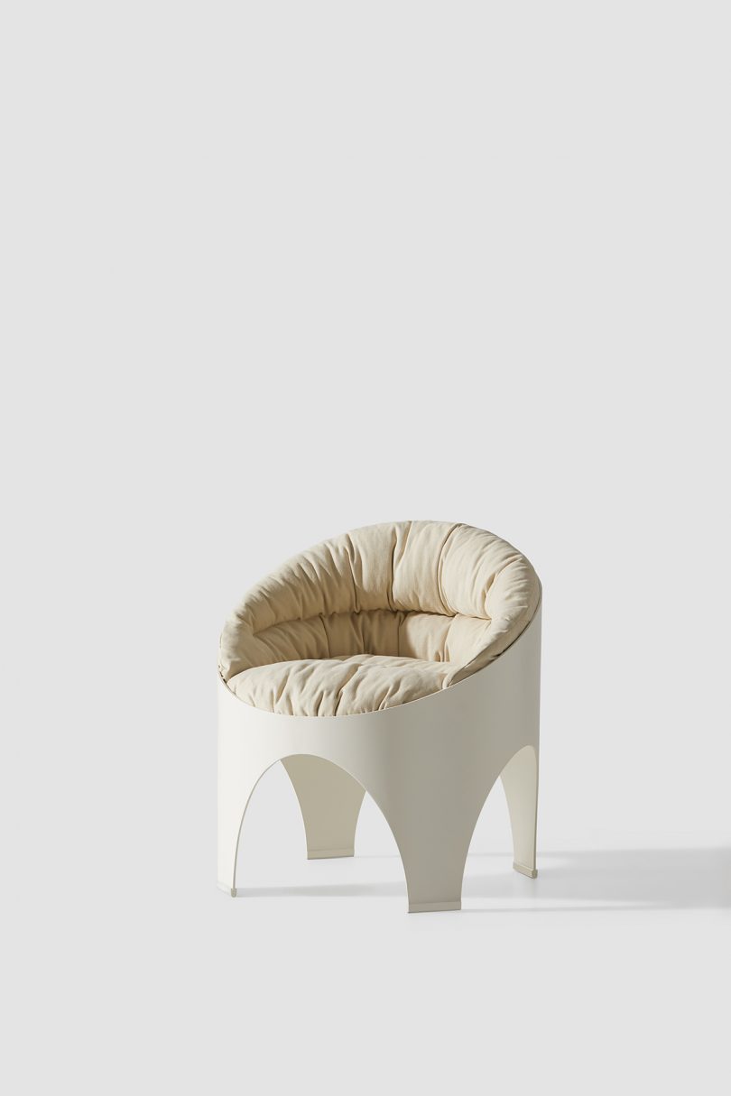 white chair with large cushioned seat