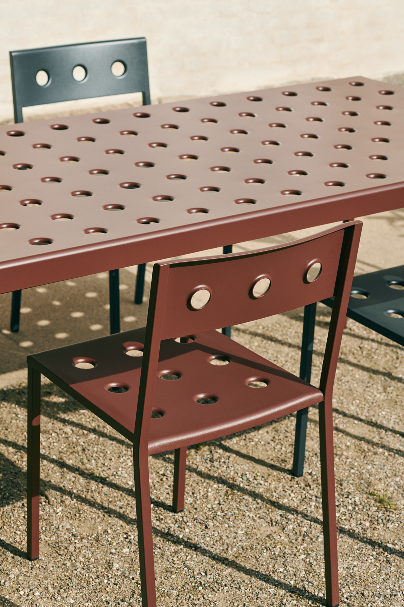 rust colored outdoor chair and table