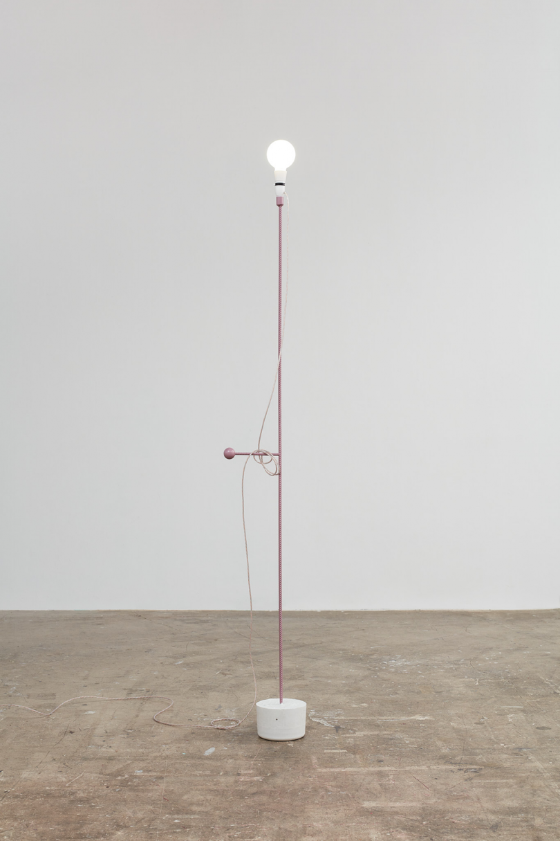 simple floor lamp with exposed bulb