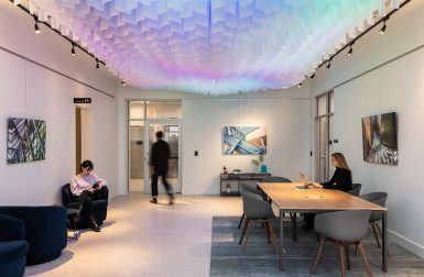1000 LED-Illuminated Translucent Flags Transform This Lobby Into a Digital Sky