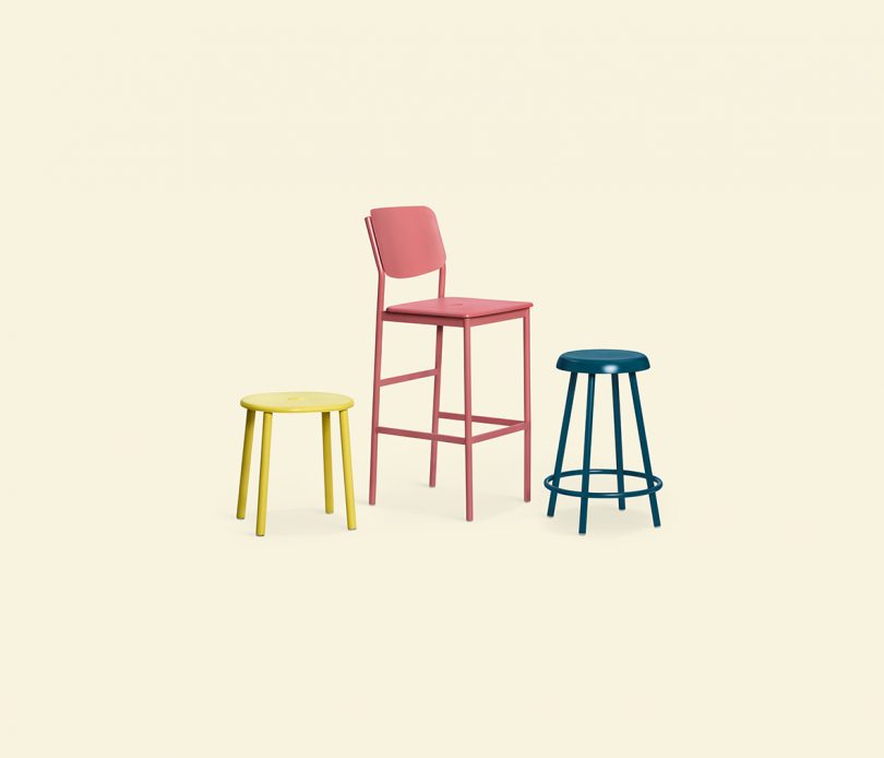 yellow, red, and blue stool on cream colored background