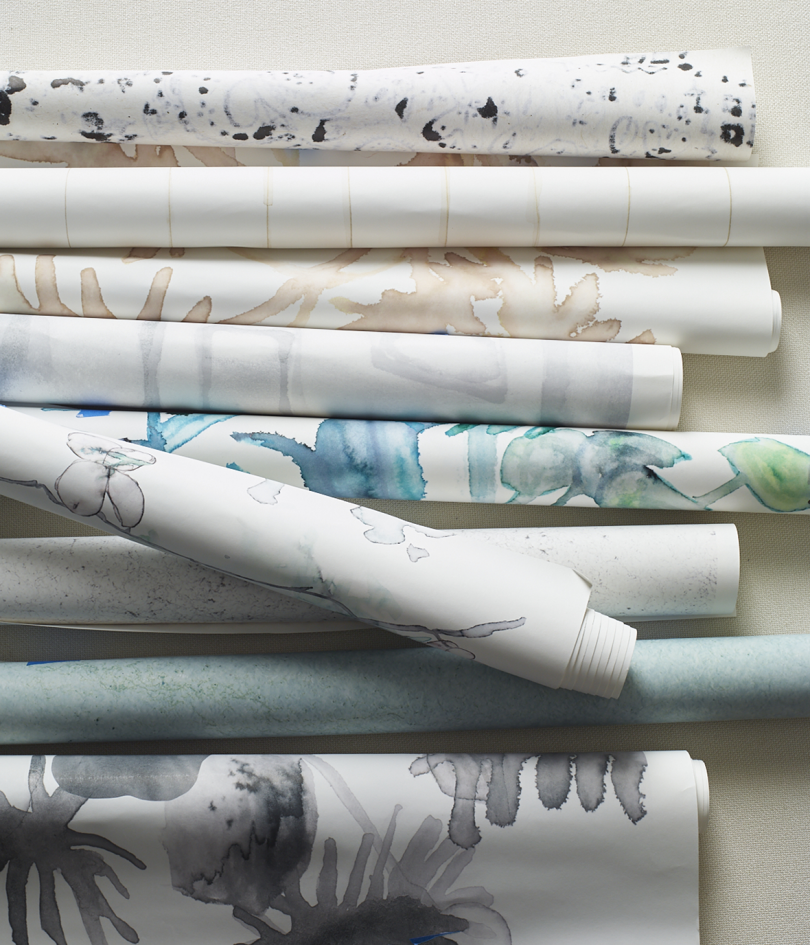 pile of wallpaper rolls
