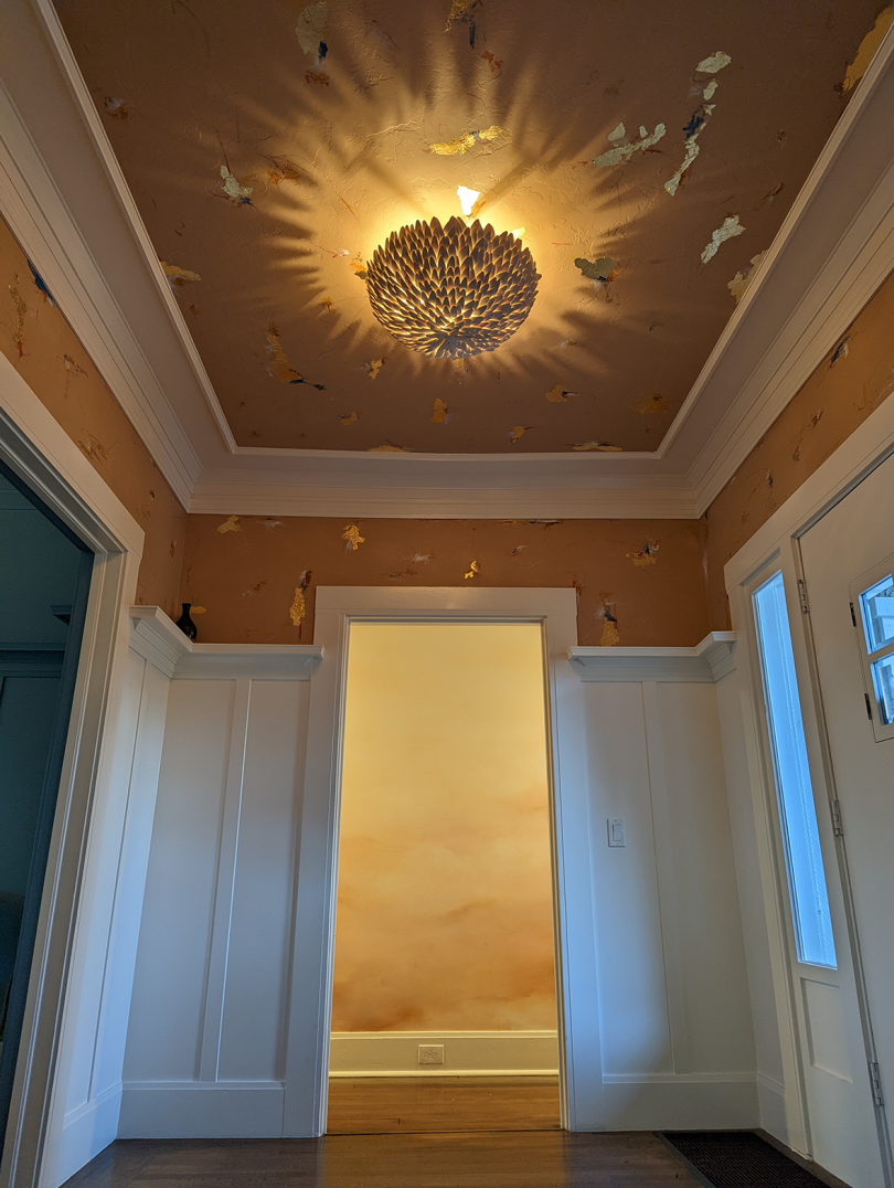 hand-painted entryway and ceiling