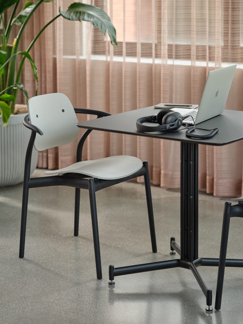 dining chair and table with laptop
