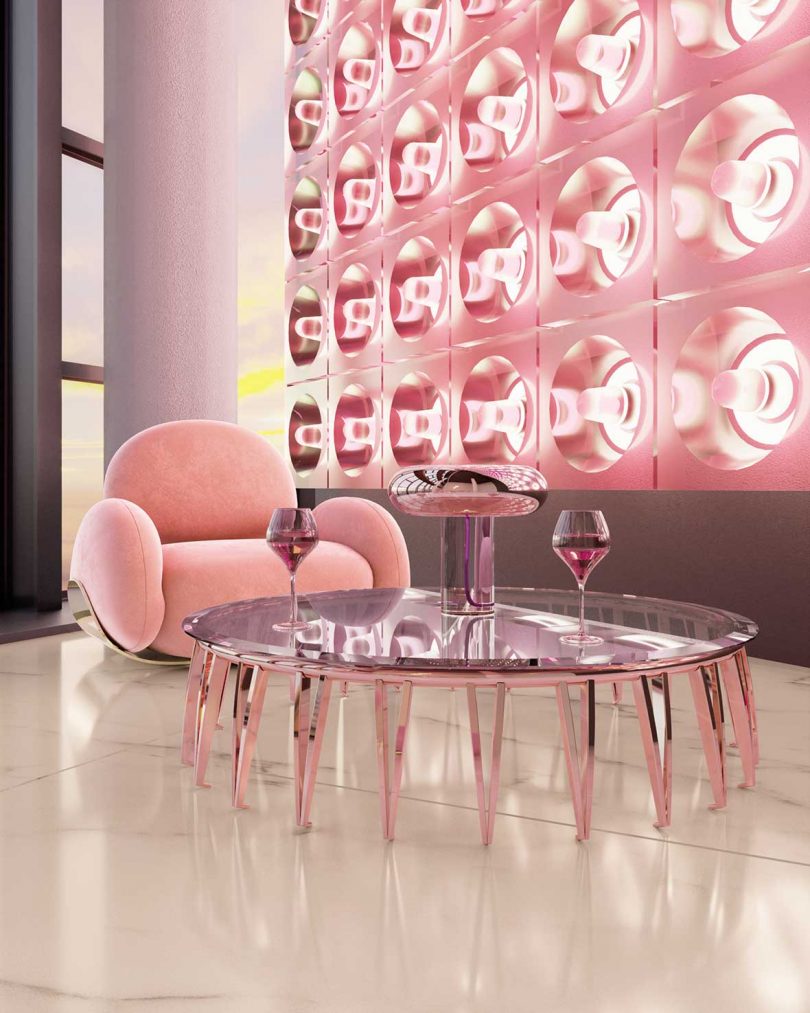 pink armchair and lucite table with many legs