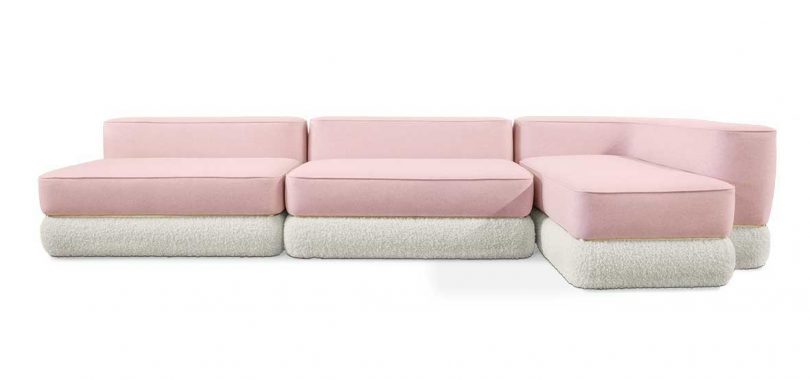 pink and white sofa with chaise on white background