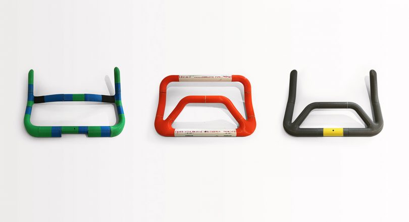 Three prototype handlebar designs in green, red and black.