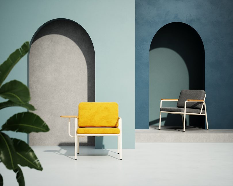 two indoor/outdoor armchairs styled in front of dusty blue walls with arches