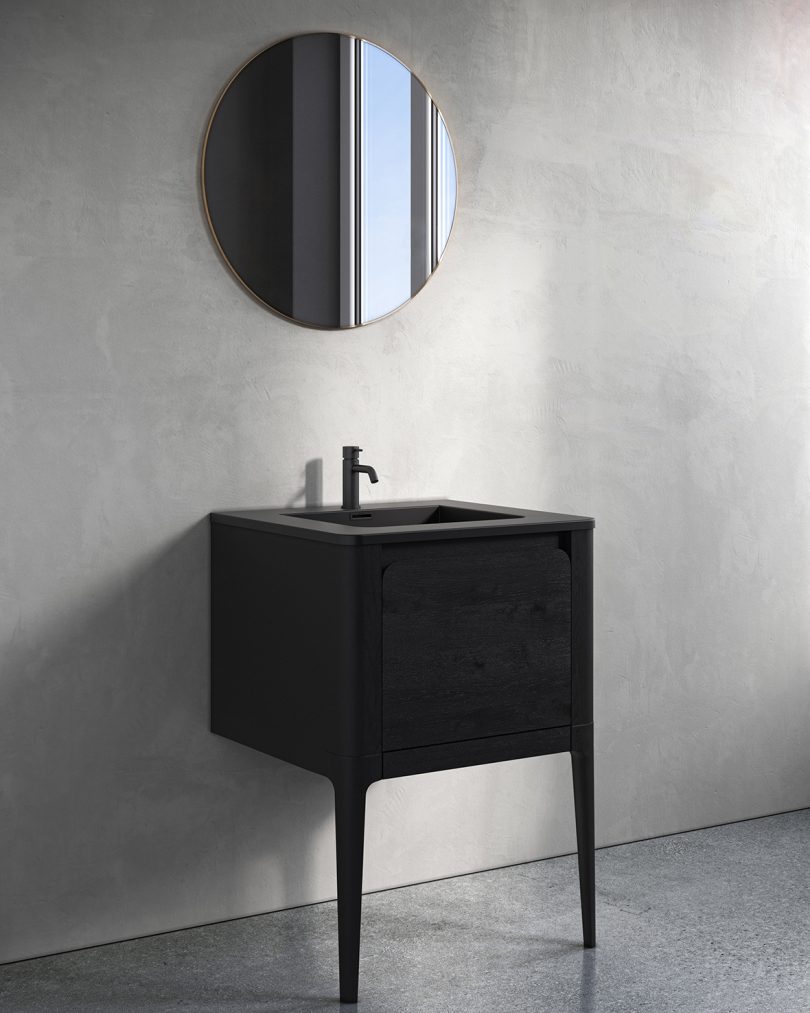 styled black bathroom vanity with legs