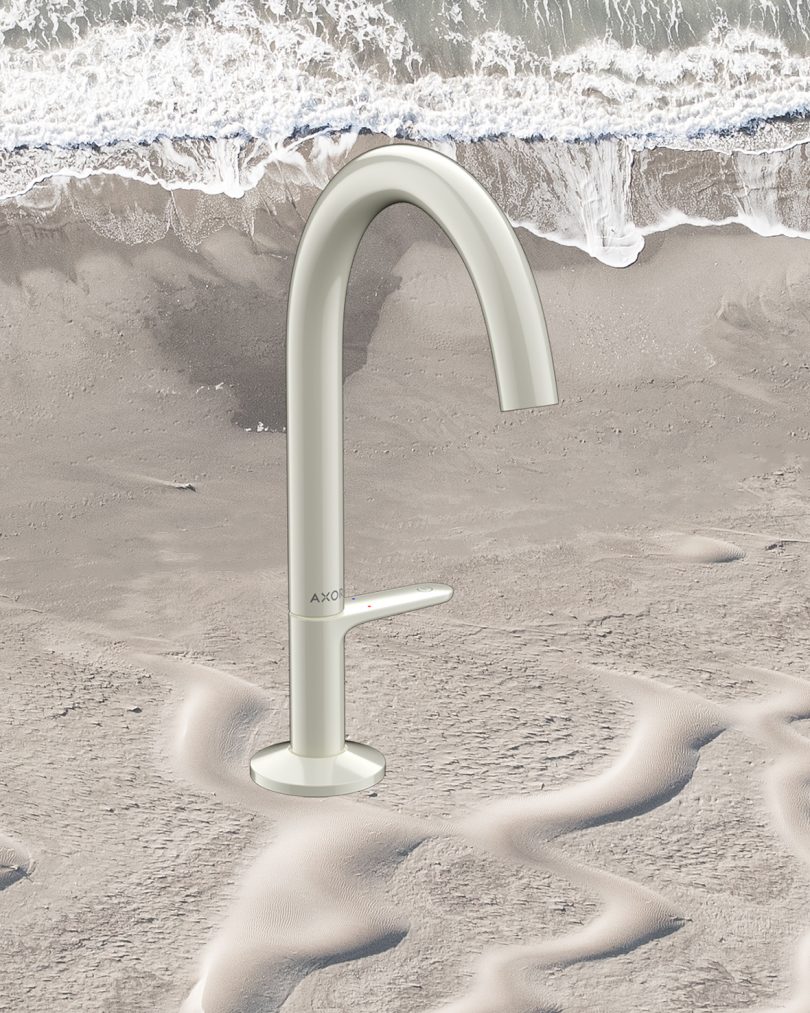 light beige grey sink faucet superimposed over image of the beach