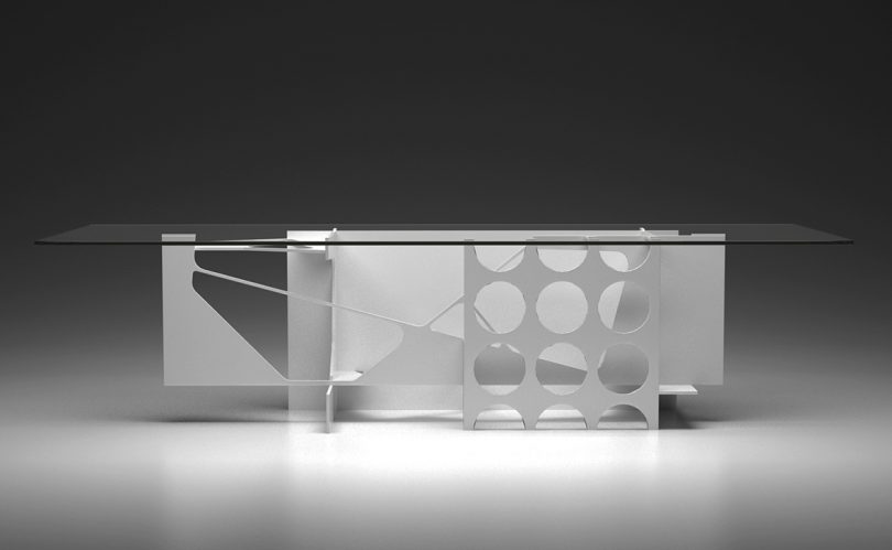 modern geometric white dining table against a black background