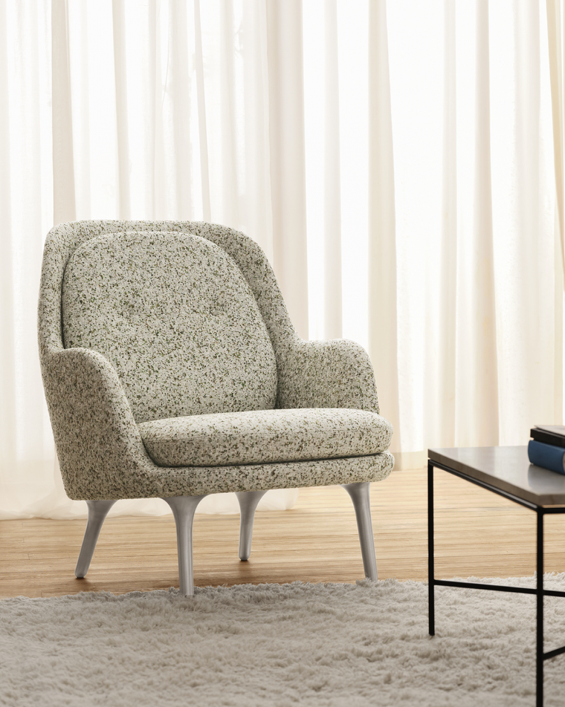 light grey upholstered armchair in living space