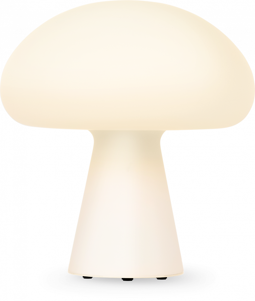 lit mushroom-shaped lamp on white background