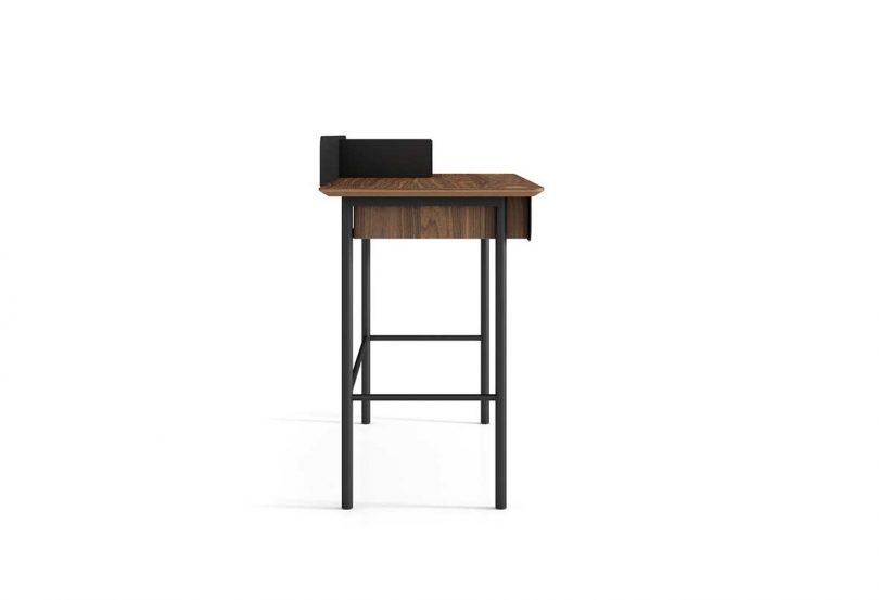 side view of mixed light and dark wood desk on white background