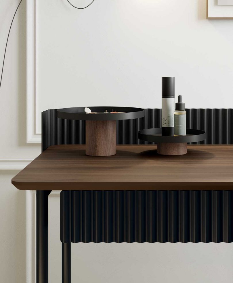 detail of styled dark wood desk