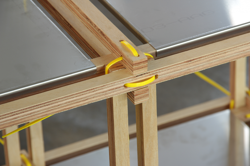 detail of wood furniture system in an empty warehouse