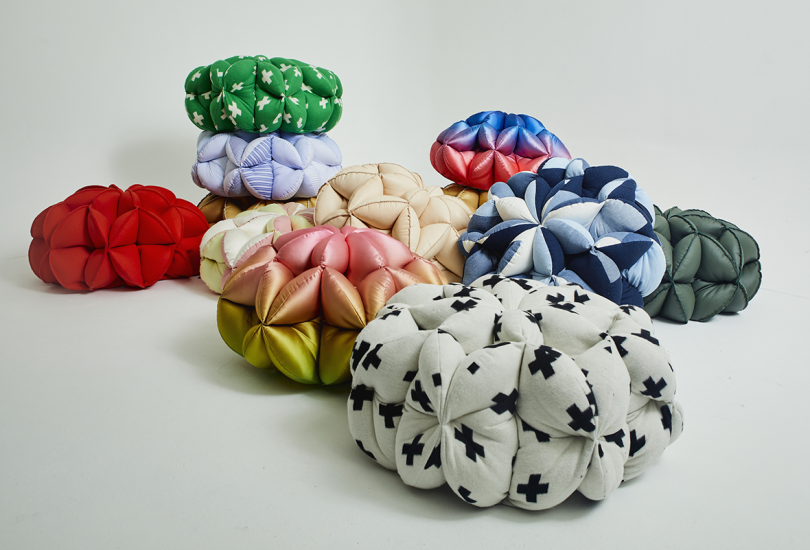 several colorful poufs