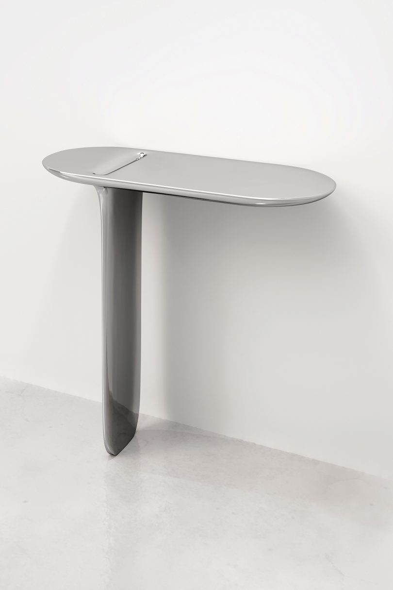 minimal console table with one leg