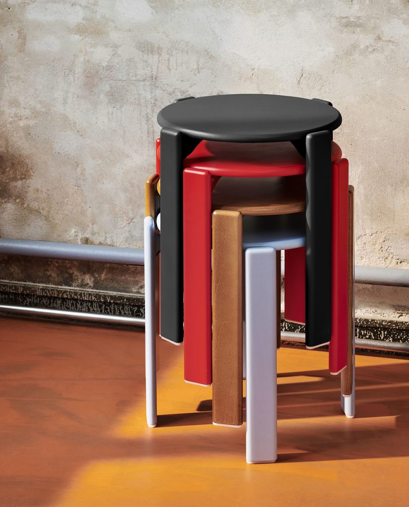 four colorful stool stacked on top of one another