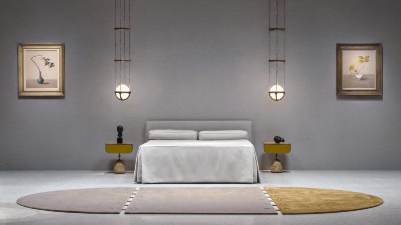 staged bedroom with bed, nightstands, light pendants, and floor rug