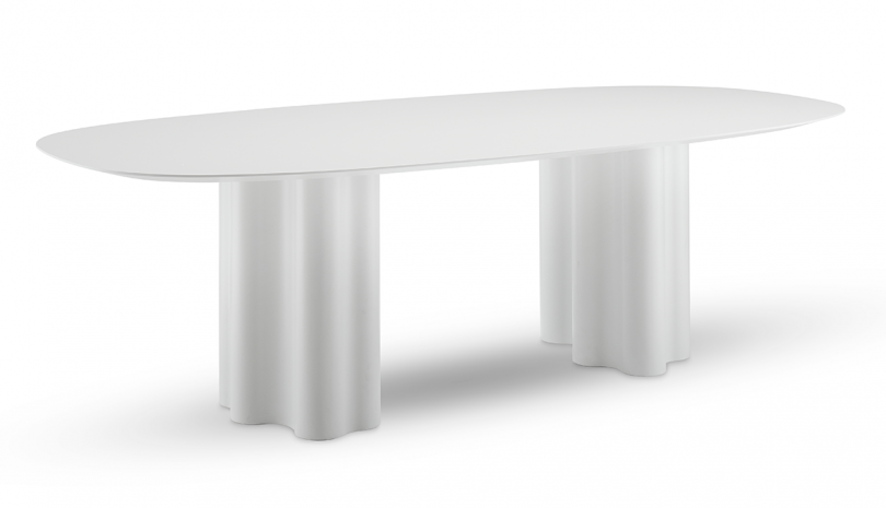 white dining table with ruffled double base on white background
