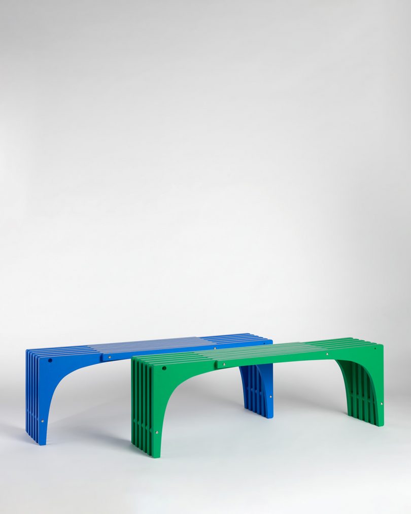 blue and green benches on gray background