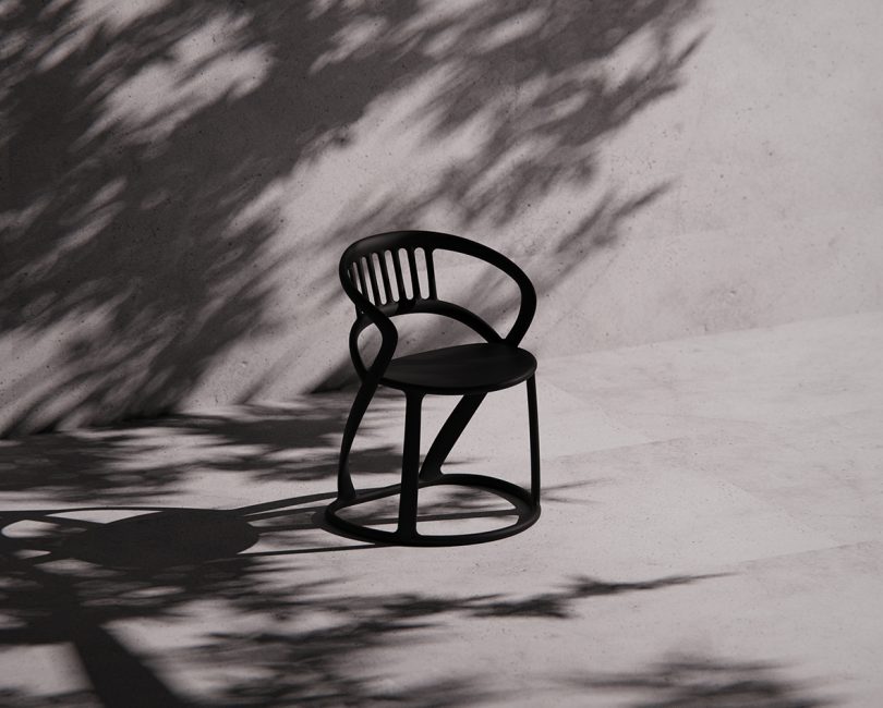 black chair sitting outside in shade
