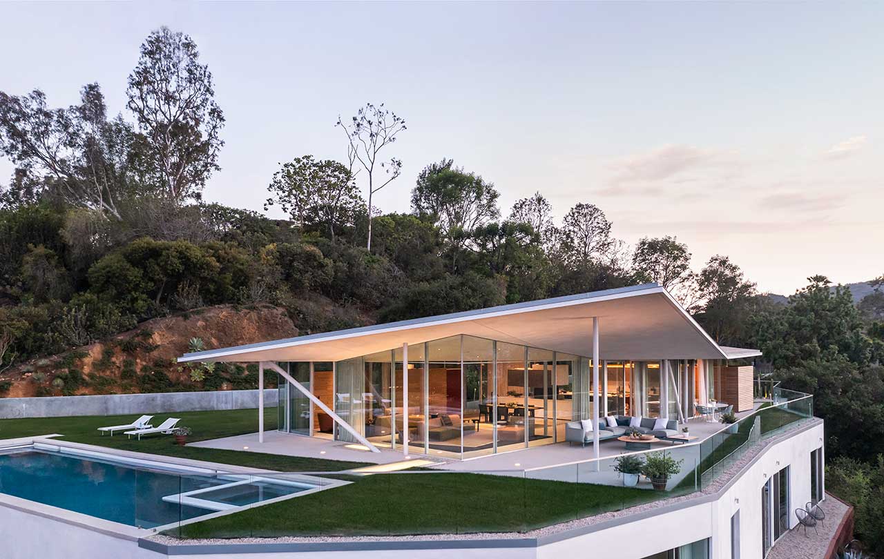 A California House Topped With Glass Pavilion + Angular Roof