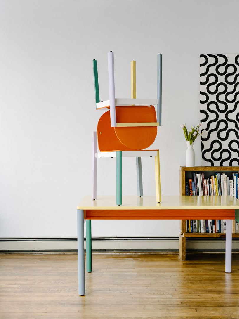multicolored desk and chairs in styled space