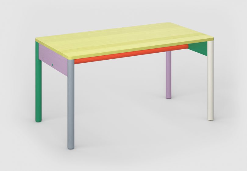 multicolored four legged desk on white background