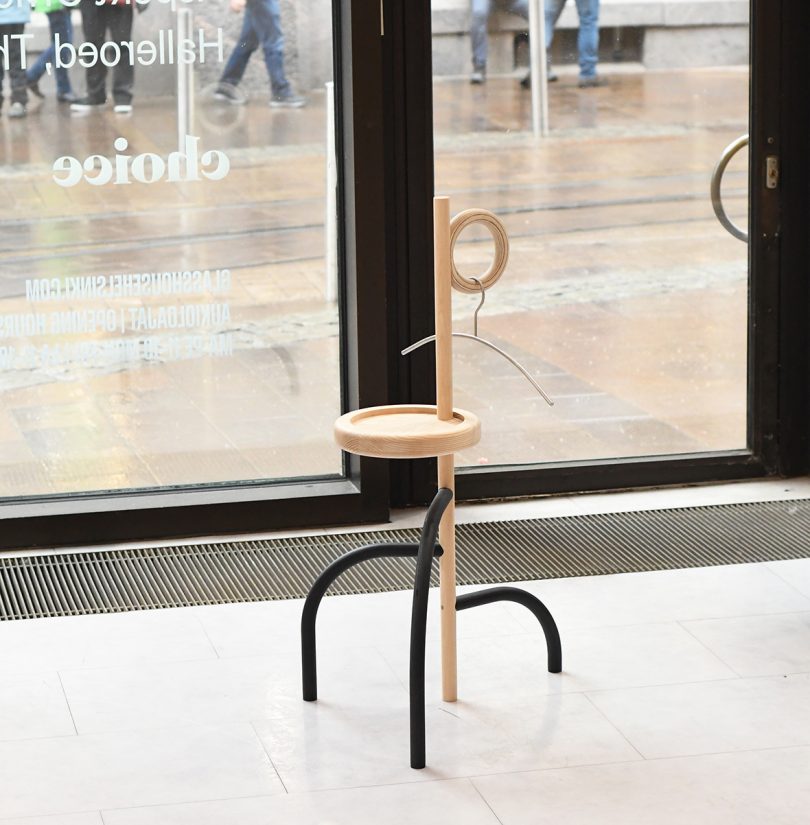 side table in the window of a gallery space