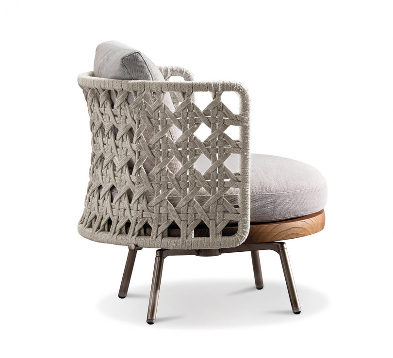 armchair with woven back and arms on white background