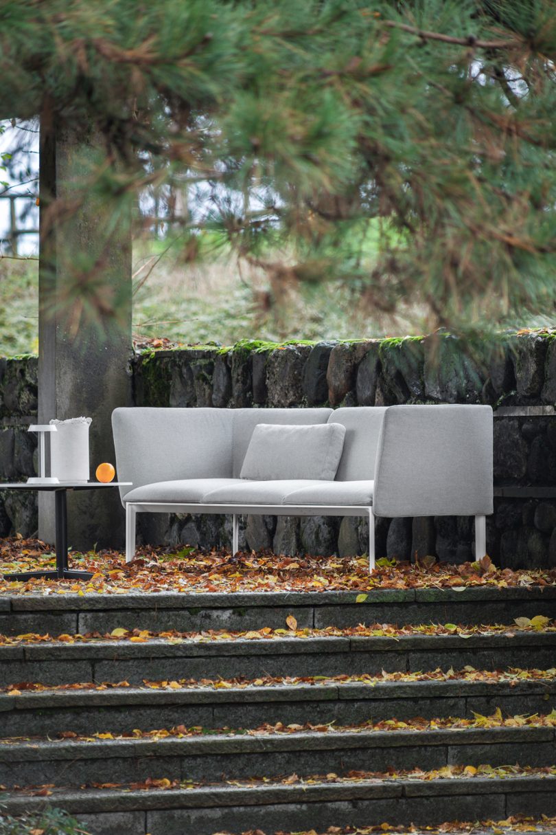 white outdoor sofa with small table