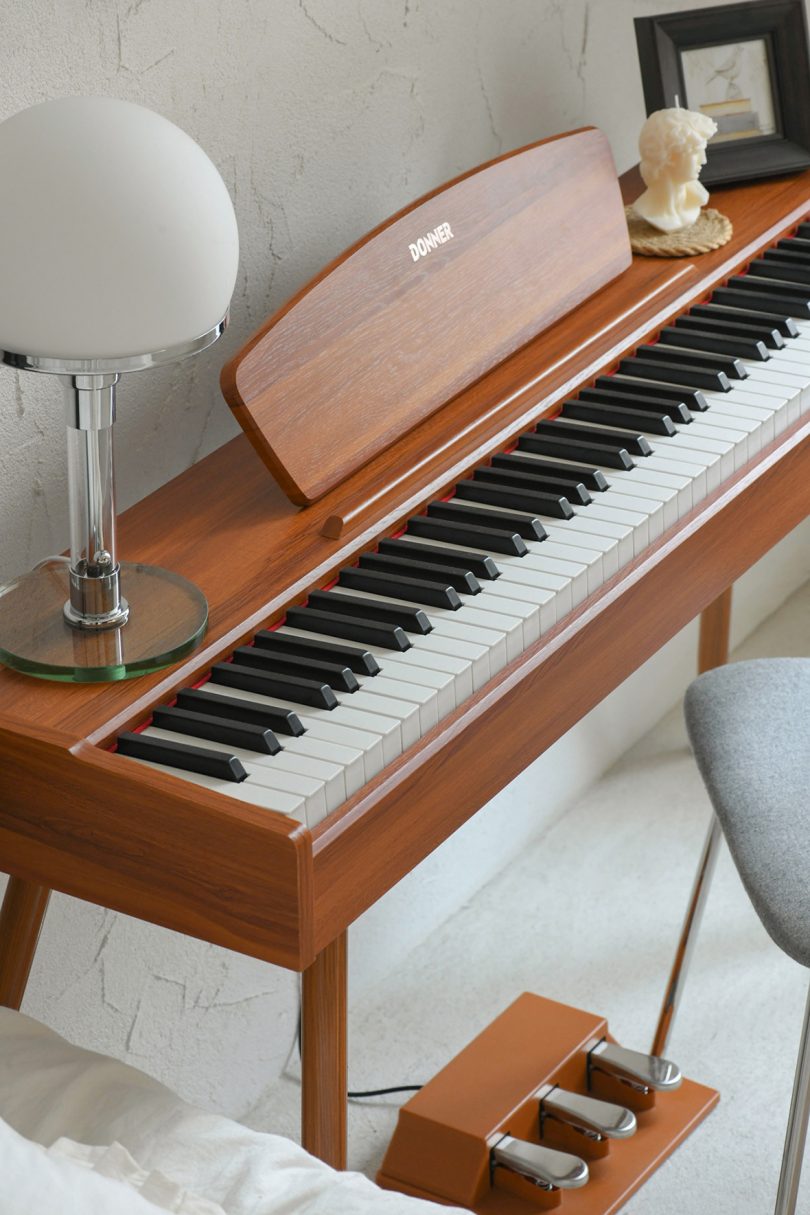 mid-century modern digital piano in styled living space