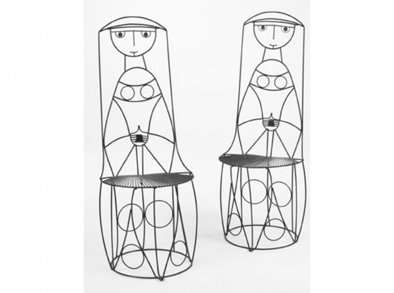 two wire chairs resembling people