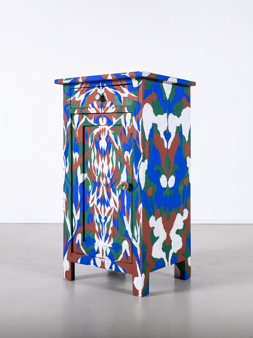 brightly patterned cabinet in exhibit space