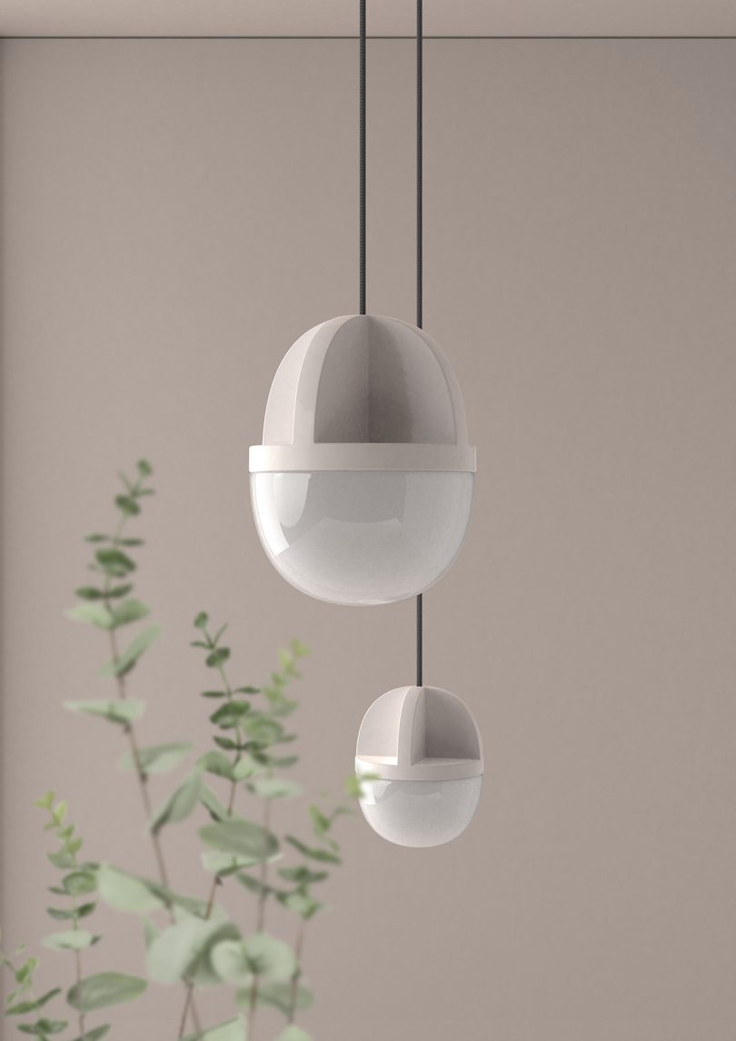 white pendant lighting hanging in a white space