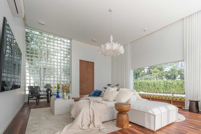 A Bangkok Home With a Bold, White Facade + Minimalist, Cozy Interior