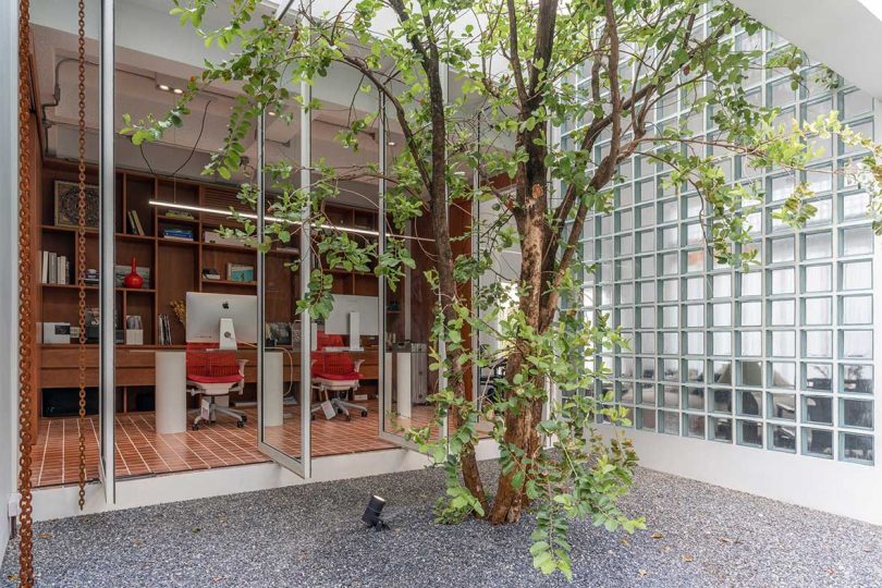 A Bangkok Home With a Bold, White Facade + Minimalist, Cozy Interior
