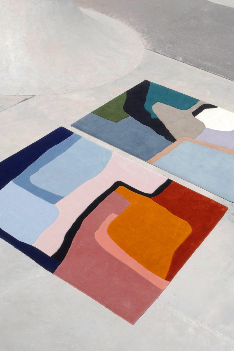 two colorful rectangle rugs with abstract shapes and bright colors