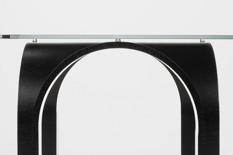 detail of black rectangle dining table on white background